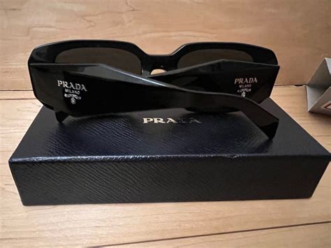 prada sun glasses brown|prada sunglasses receipt.